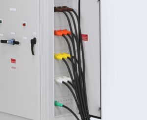 Wiring in the side of an automatic transfer switch.